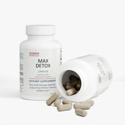 Jeemya Max Detox dietary supplement bottle displayed beside an open bottle with beige capsules spilling onto the surface, illustrating the capsule size, product contents, and premium packaging.