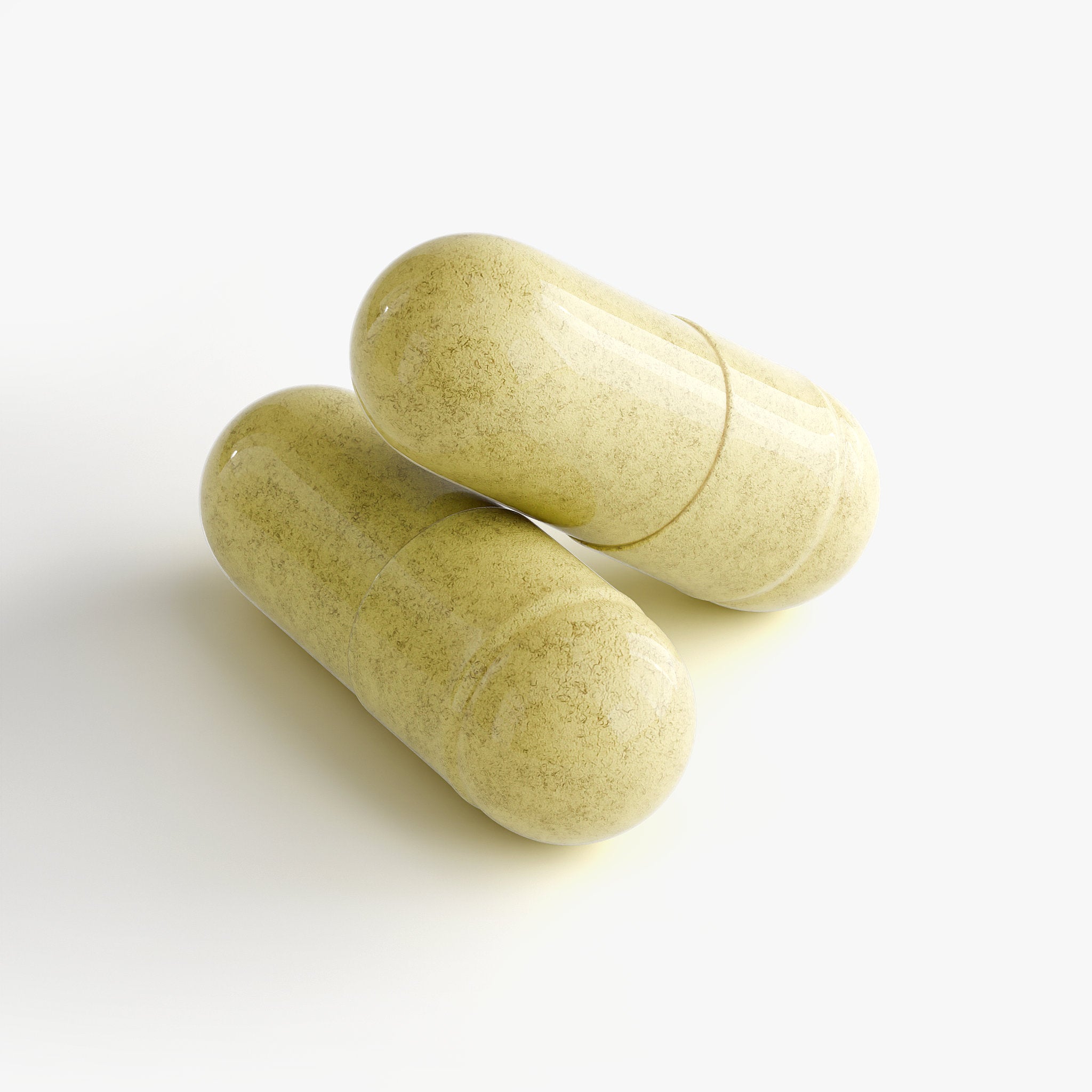 Close-up of two beige NAD+ supplement capsules containing ingredients designed to support energy production, cellular regeneration, and overall wellness.